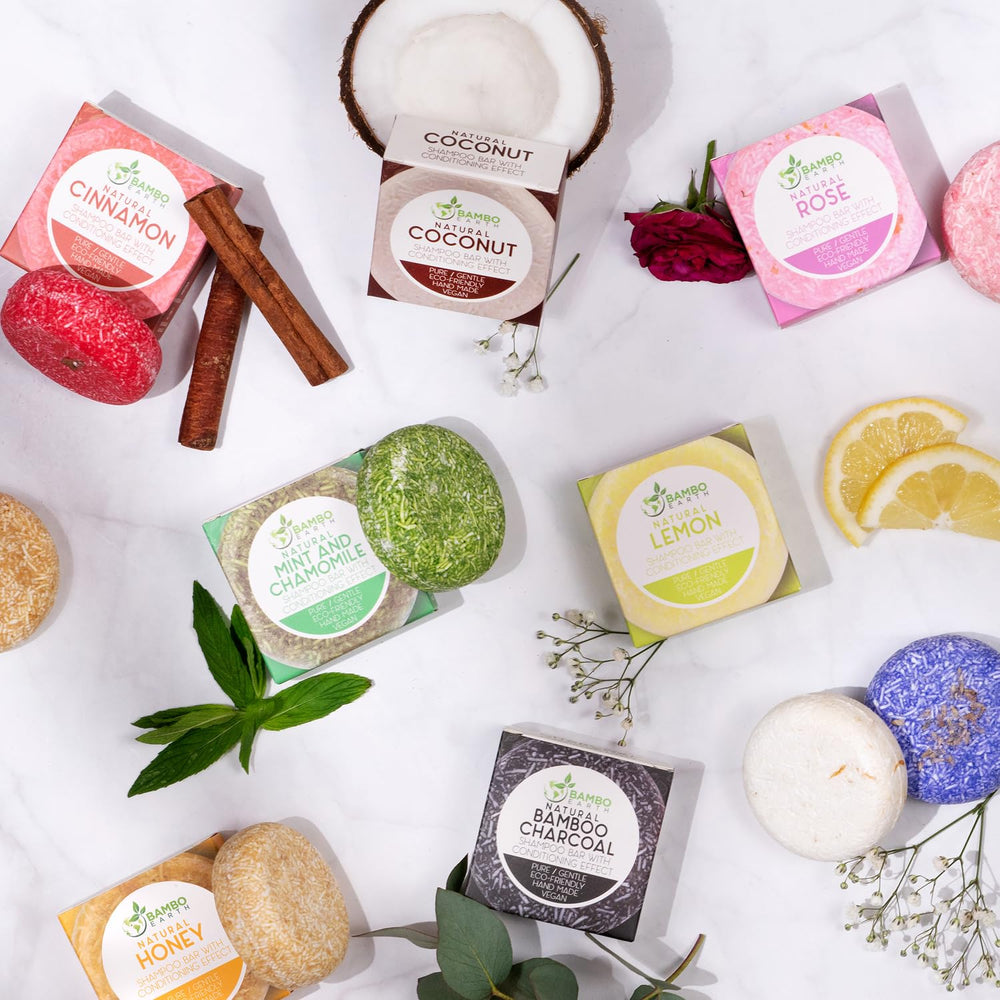 BAMBOEARTH natural ingredient display with rose and ginseng showing plant-based care benefit