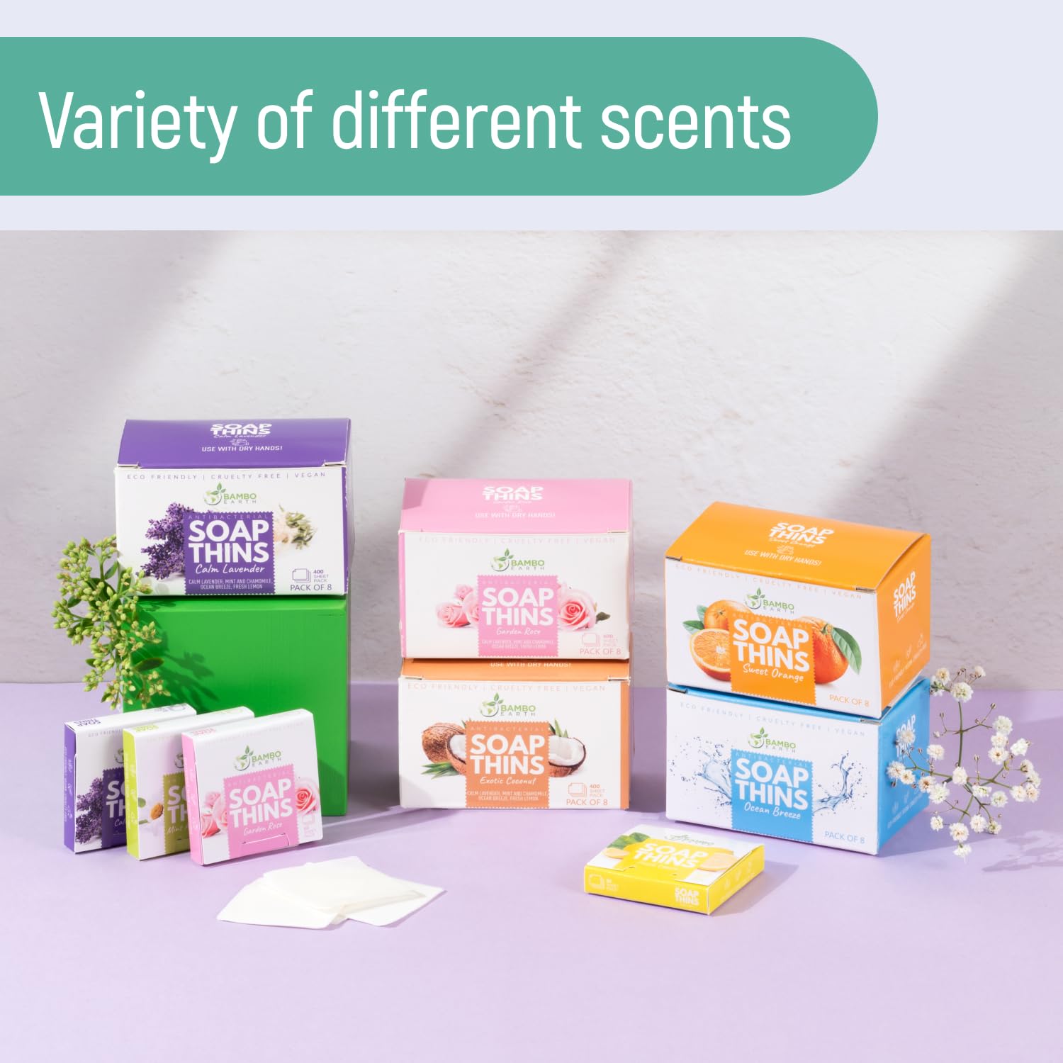 BAMBOEARTH pack next to a phone showing pocket-sized travel practicality