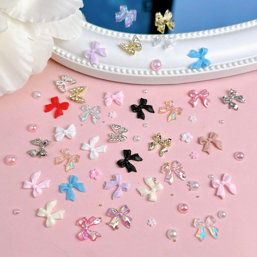BANA ART manicure in use displaying charms on nails for a finished, stylish look