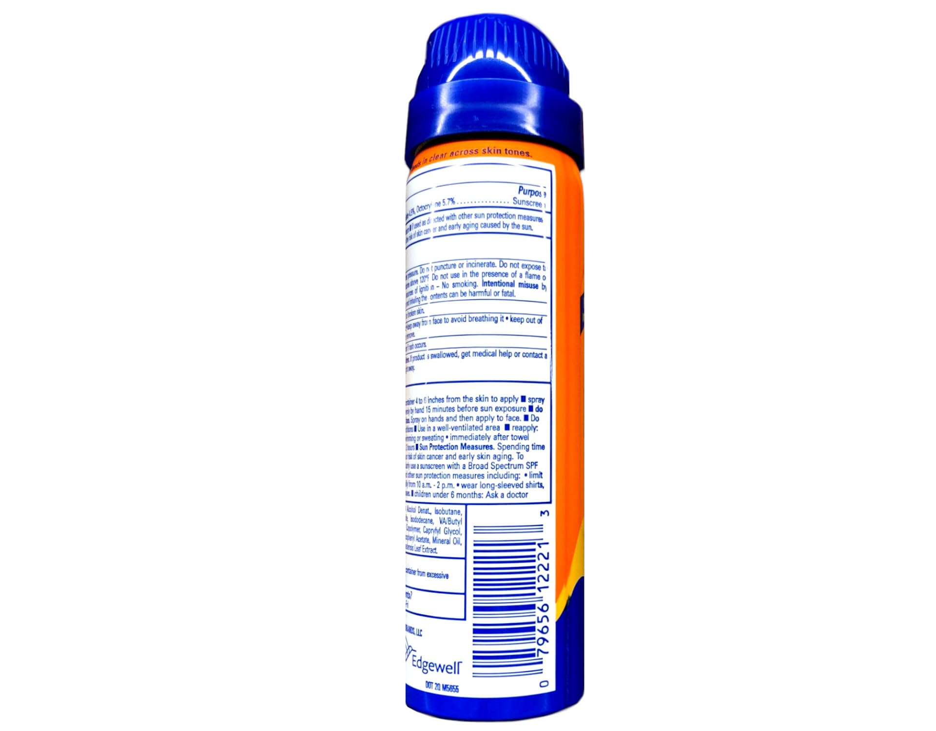 Banana Boat bottle at the beach showing sweat-resistant protection during activity
