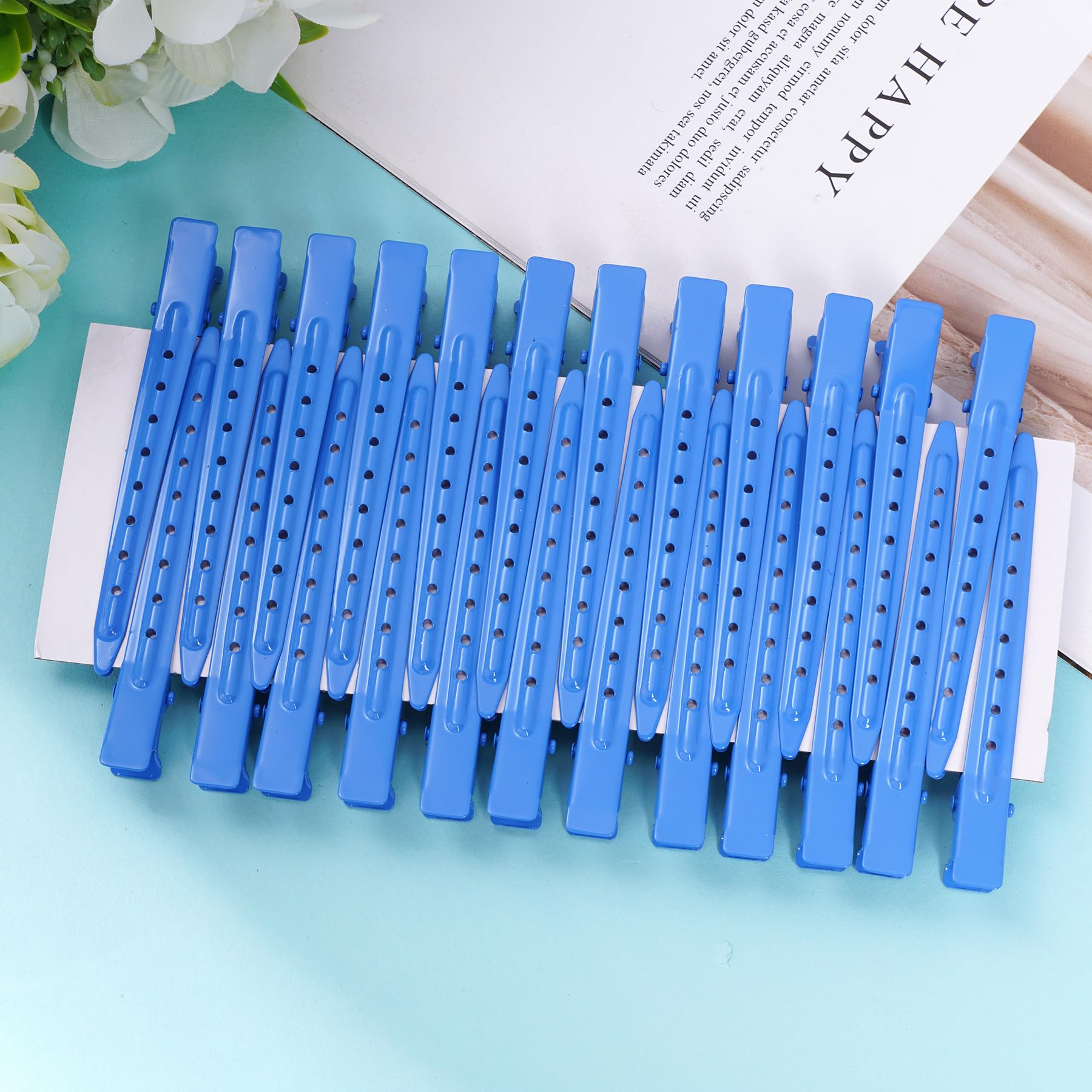 Bantoye clips holding hair section during styling showing precise control benefit
