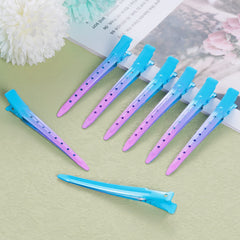 Bantoye clips in use sectioning hair during salon coloring for precision