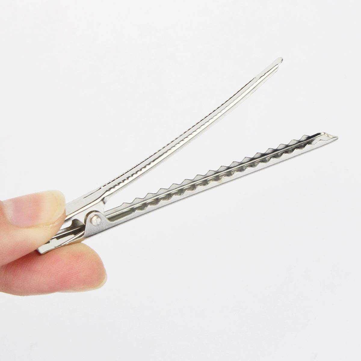 Bantoye clips next to ruler showing 3-inch length for sectioning efficiency benefit