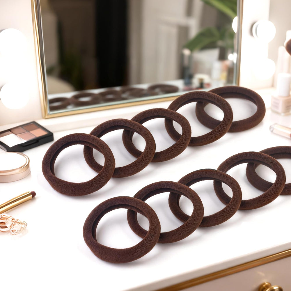 BAOLI hair tie beside a hand showing diameter and strong-stretch benefit
