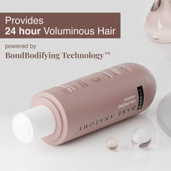 Bare Anatomy shampoo pump close-up highlighting easy dispensing benefit