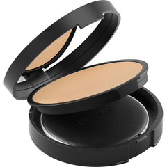 bareMinerals powder applied with brush to face, illustrating even, natural-looking setting