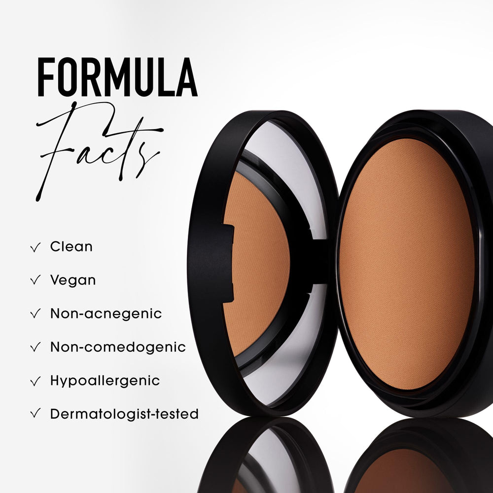 bareMinerals compact held in hand showing true size and on-the-go ease
