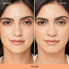 bareMinerals brush applying powder on model for long-lasting makeup benefit