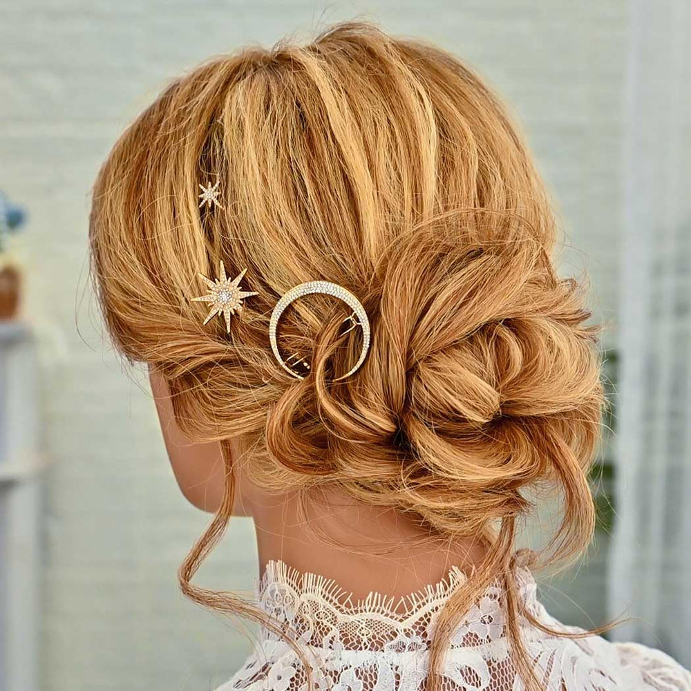 BARTOSI clips placed in a braided updo showing decorative celestial accents