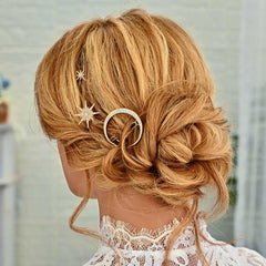 BARTOSI clips placed in a braided updo showing decorative celestial accents