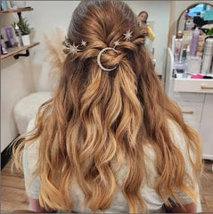 BARTOSI bridesmaid wearing clips in an updo conveying refined event-ready look