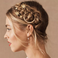 BARTOSI front view of three gold moon star clips showing elegant packaging and shimmer