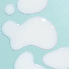 Bask serum spread on hand demonstrating quick absorption