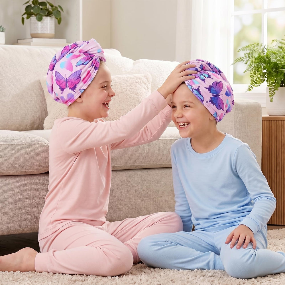 Child wearing Basumee blue turban after bath showing comfort and hands-free drying