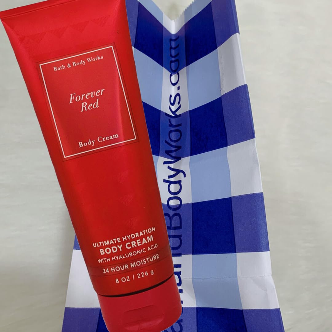 Bath & Body Works FOREVER RED next to a ruler showing the 8 ounce size