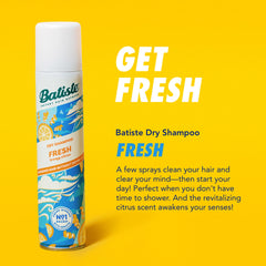Batiste being sprayed into hair demonstrating quick refresh benefit
