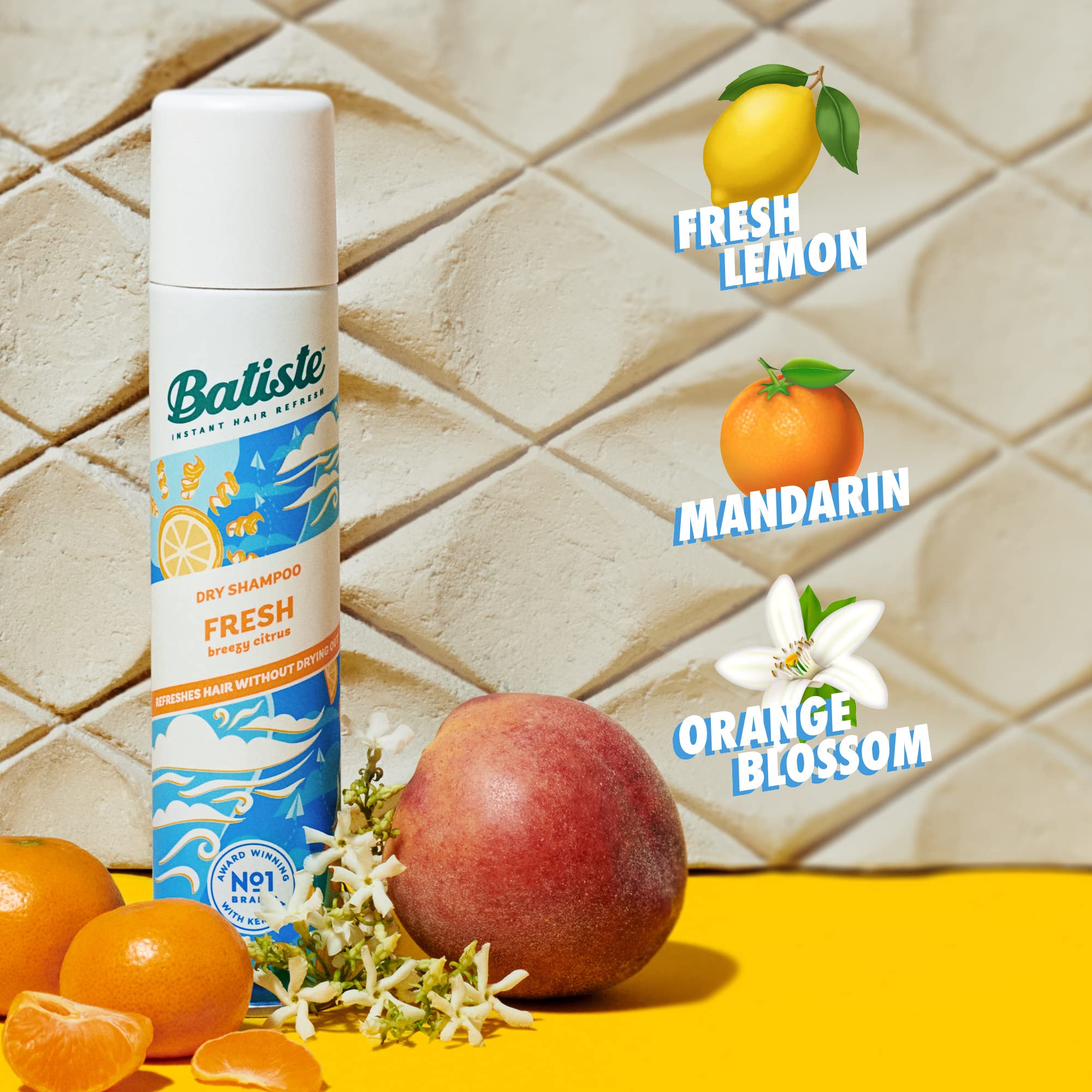 Batiste being sprayed at roots to instantly add volume and texture