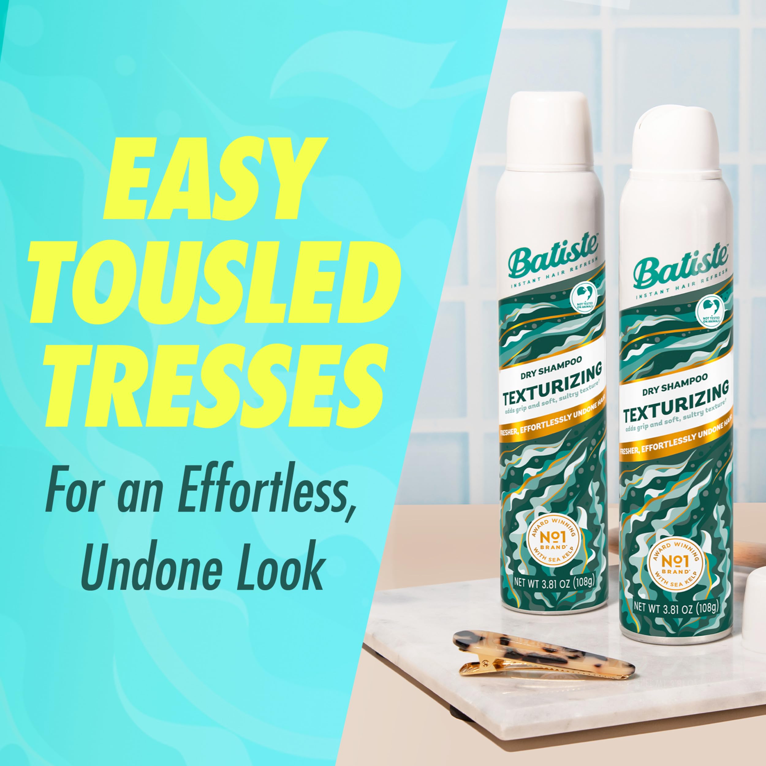 Batiste being sprayed at roots adding instant lift and grip to hair