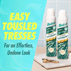 Batiste being sprayed at roots adding instant lift and grip to hair