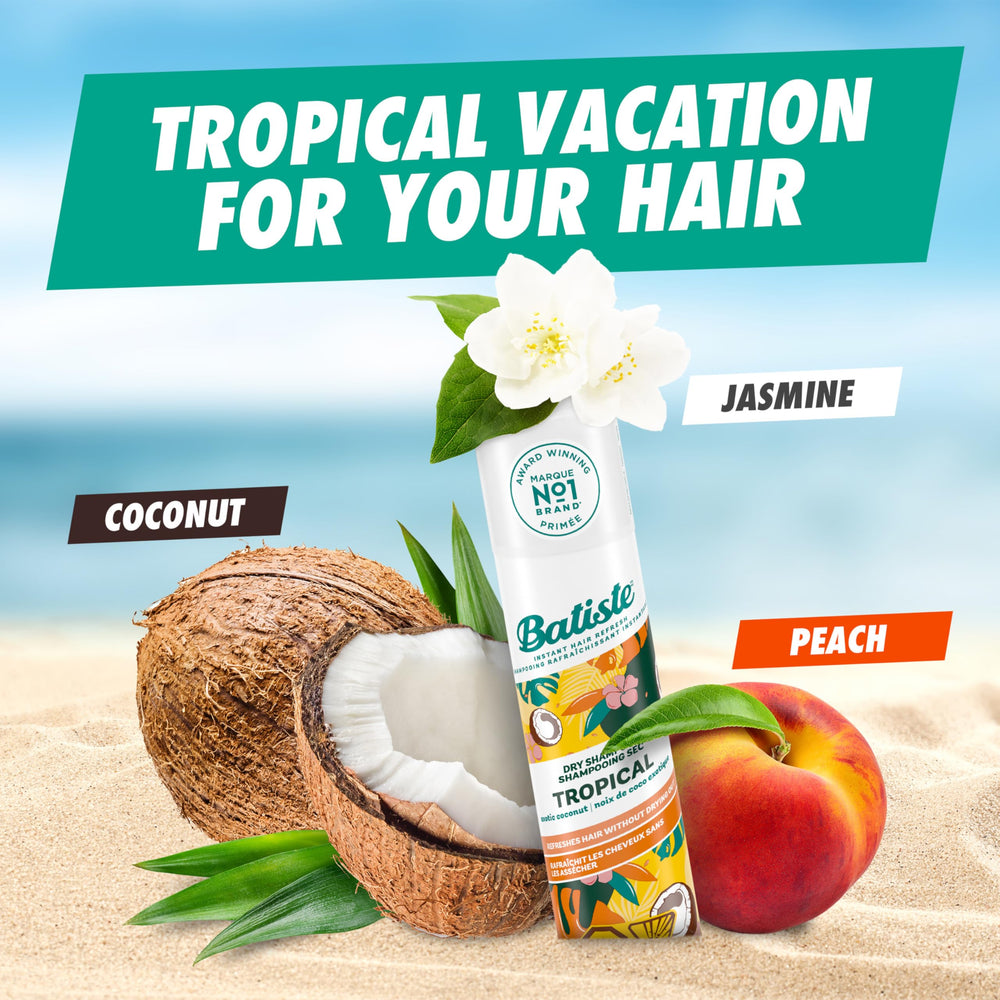 Closeup of applying Batiste Tropical at roots, adds volume and removes oil