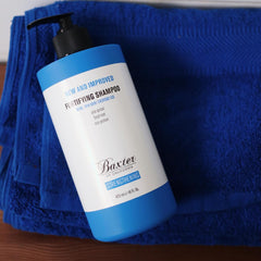 close-up of Baxter of California pump dispensing shampoo for easy use benefit