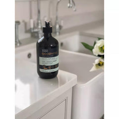 Baylis & Harding bottle held in hand for size comparison and practical scale