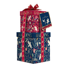 Baylis & Harding size comparison next to ornament shows travel-friendly scale benefit