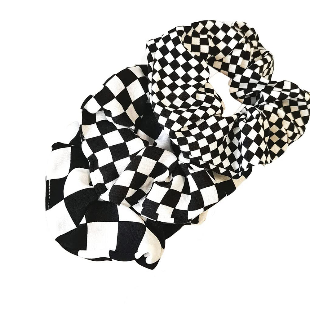 BBTDIN close-up showing fabric texture and checkerboard pattern, gentle hold