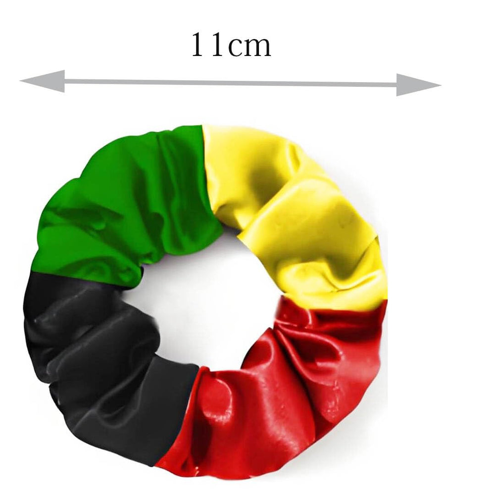 BBTDIN scrunchie worn by model in ponytail adding festive color and secure hold