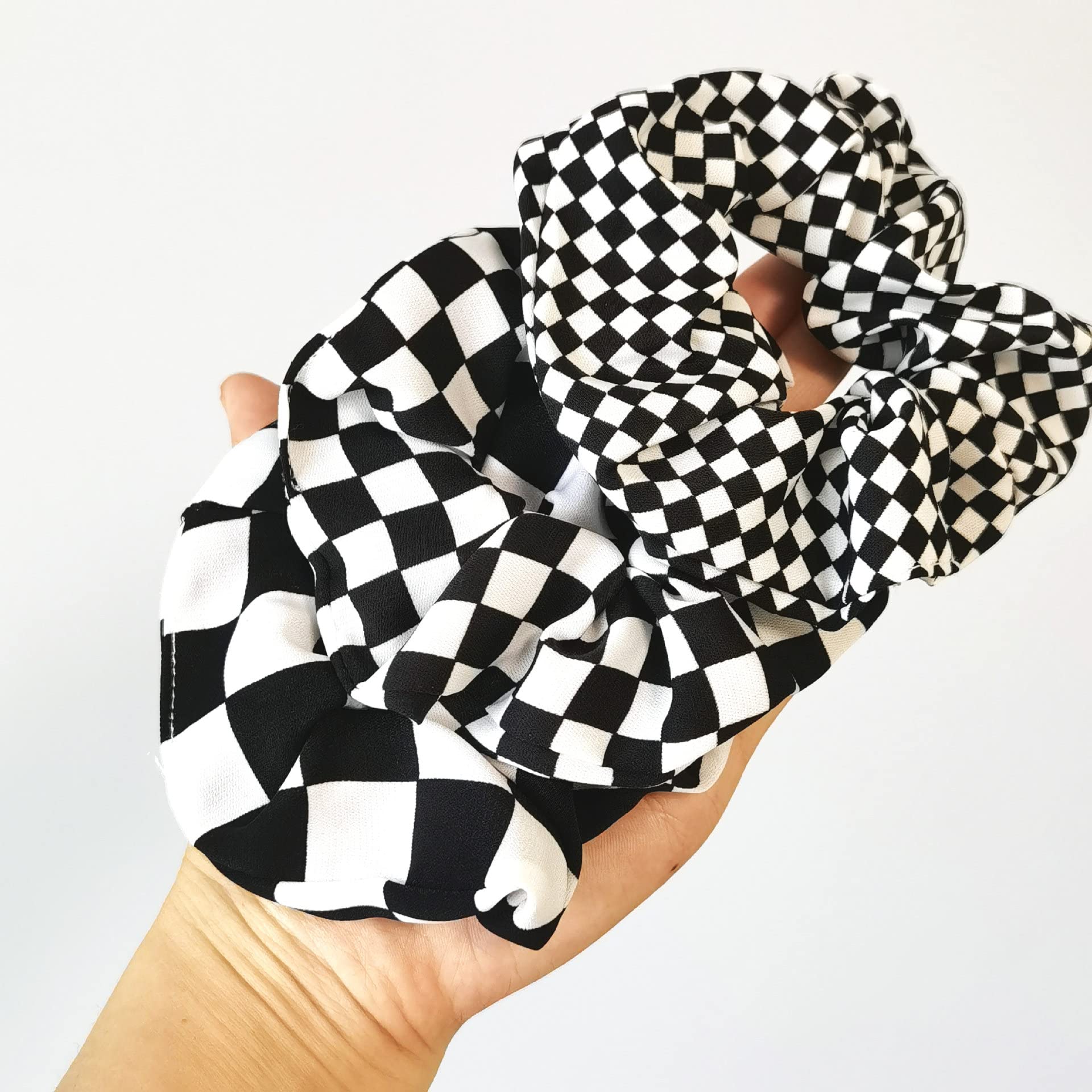 BBTDIN scrunchie worn on wrist as accessory, convenient and fashionable