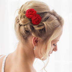 BBTO rose clips styled in bun demonstrating secure hold and decorative effect