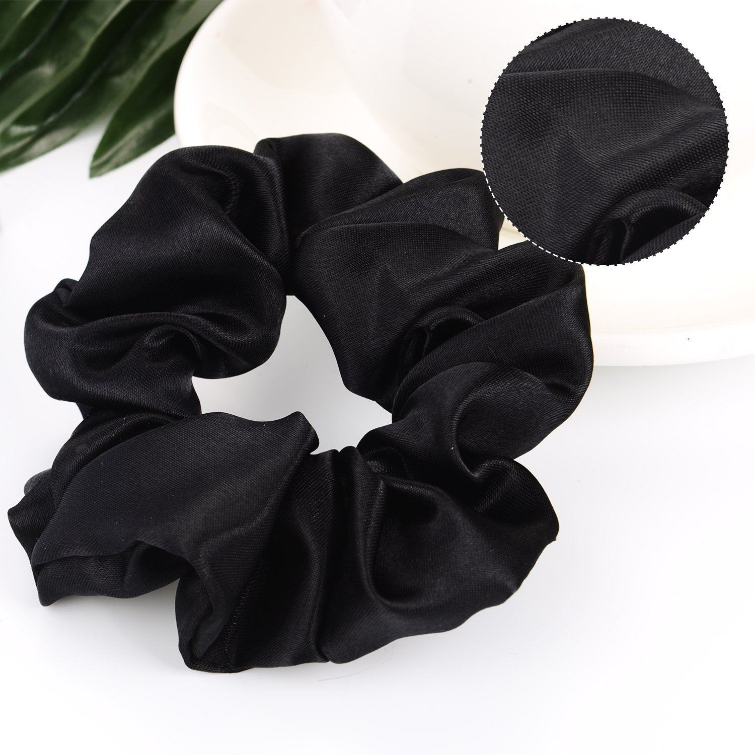 BBTO scrunchie holding a ponytail neatly without creasing hair