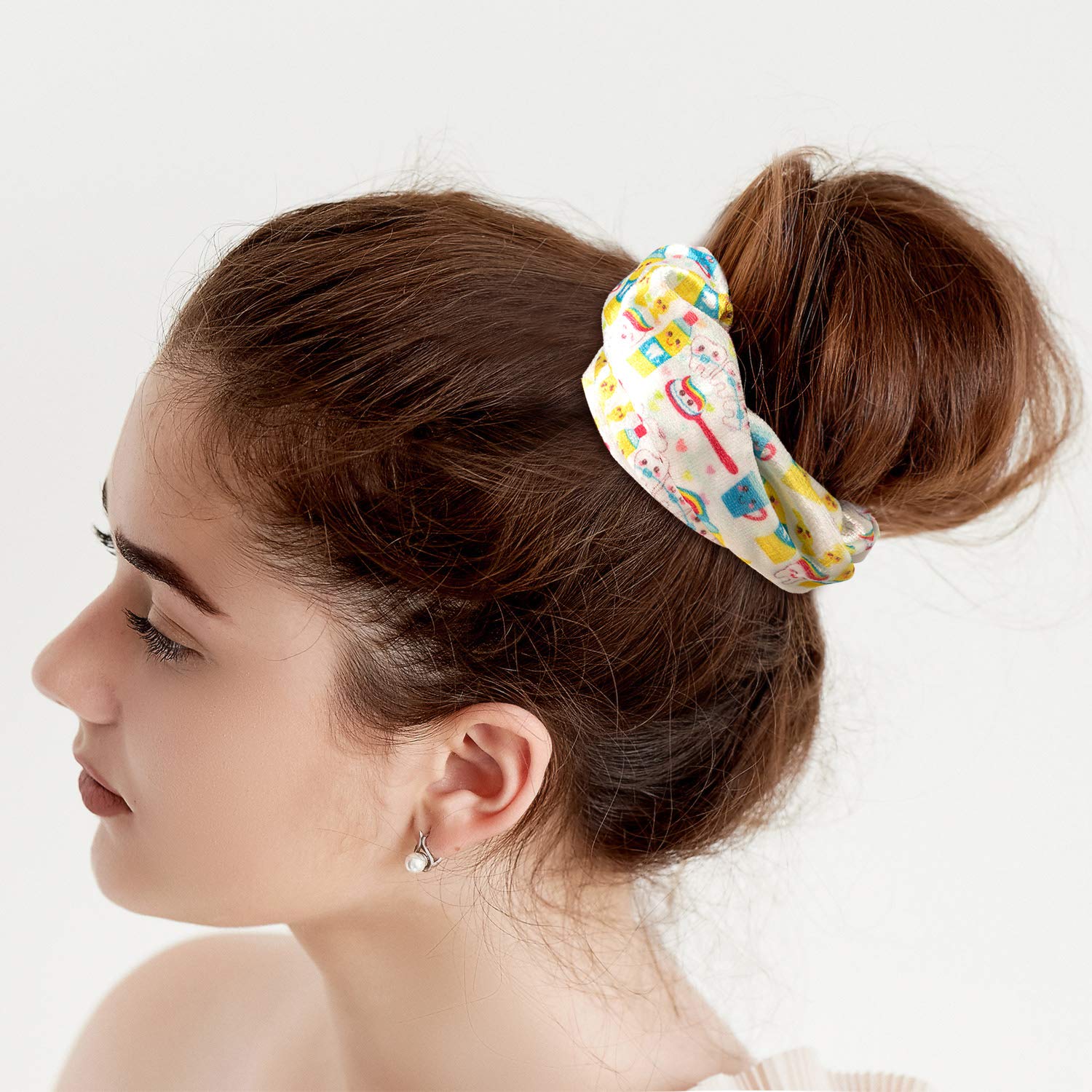 BBTO lifestyle image with scrunchies beside scrubs for stylish, practical workwear