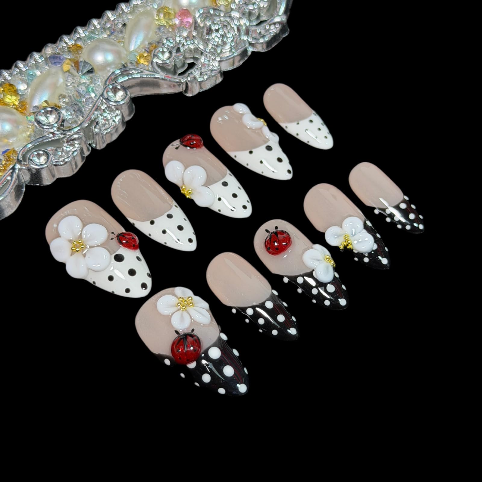 BByogooz tiny red ladybug embellishment on nail, adding playful charm