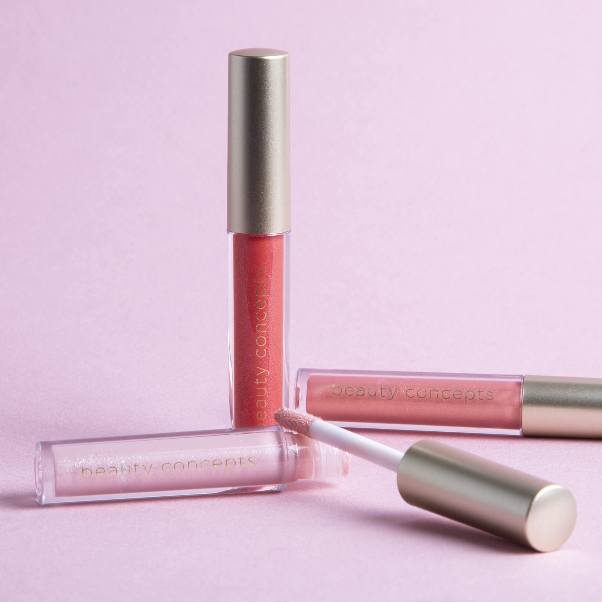 B.C BEAUTY CONCEPTS tube close-up showing applicator tip and smooth gloss finish