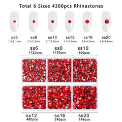 BEADSLAND rhinestones being placed on a manicure using tweezers, improving precision