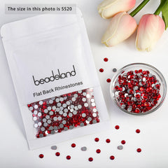 BEADSLAND rhinestones applied to nails highlighting bold color and long-lasting manicure benefit