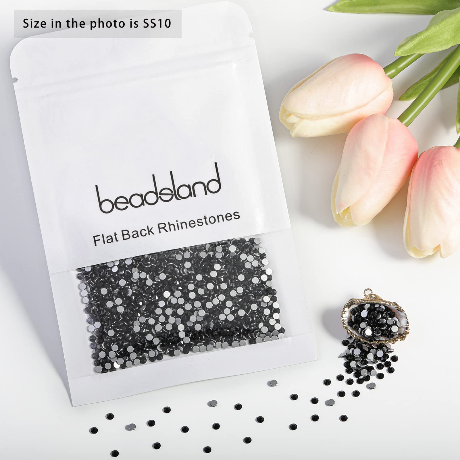 BEADSLAND rhinestones applied to manicure for polished accent
