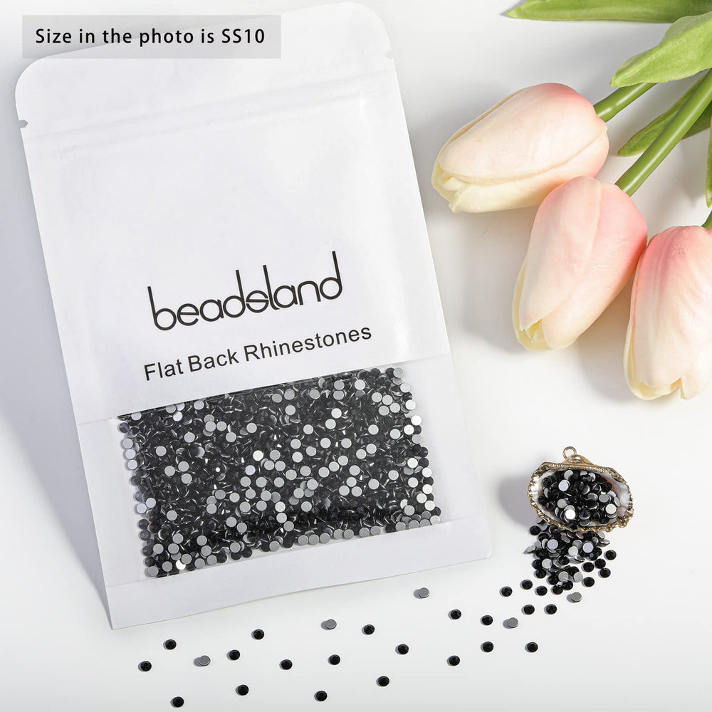 BEADSLAND rhinestones applied to manicure for polished accent