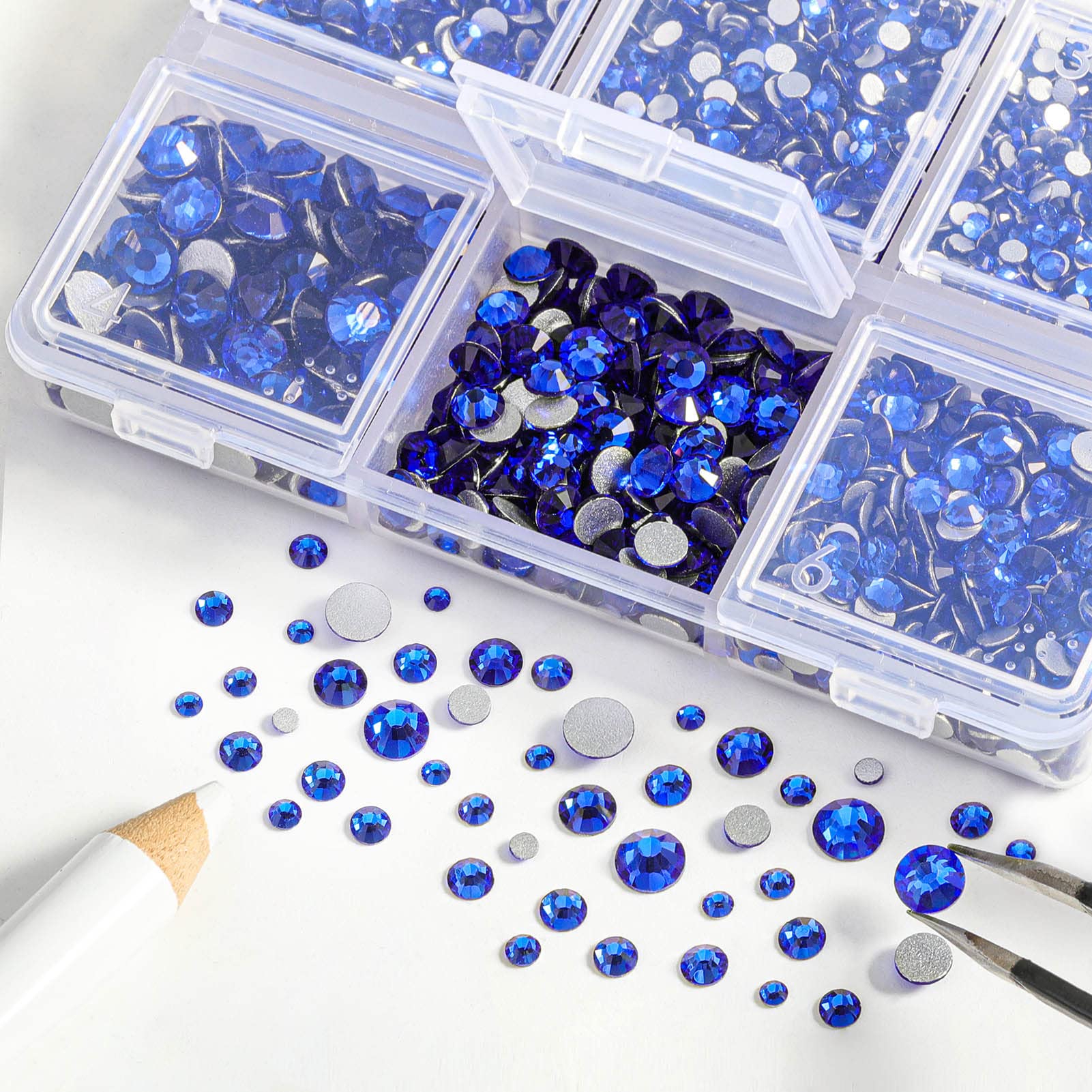 BEADSLAND tweezers and wax pick with gems ready for precise placement