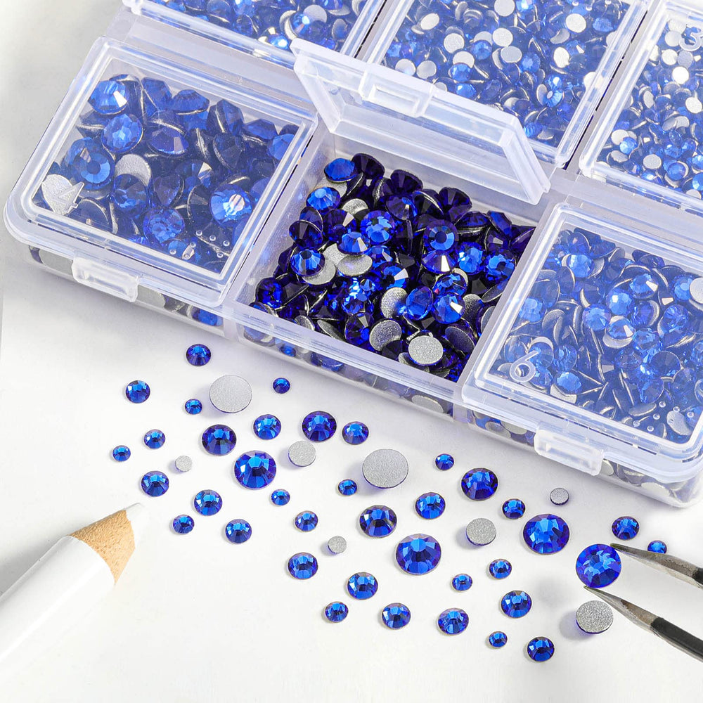 BEADSLAND tweezers and wax pick with gems ready for precise placement