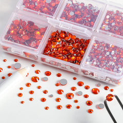 BEADSLAND tweezers and wax pencil paired with gems for precise placement