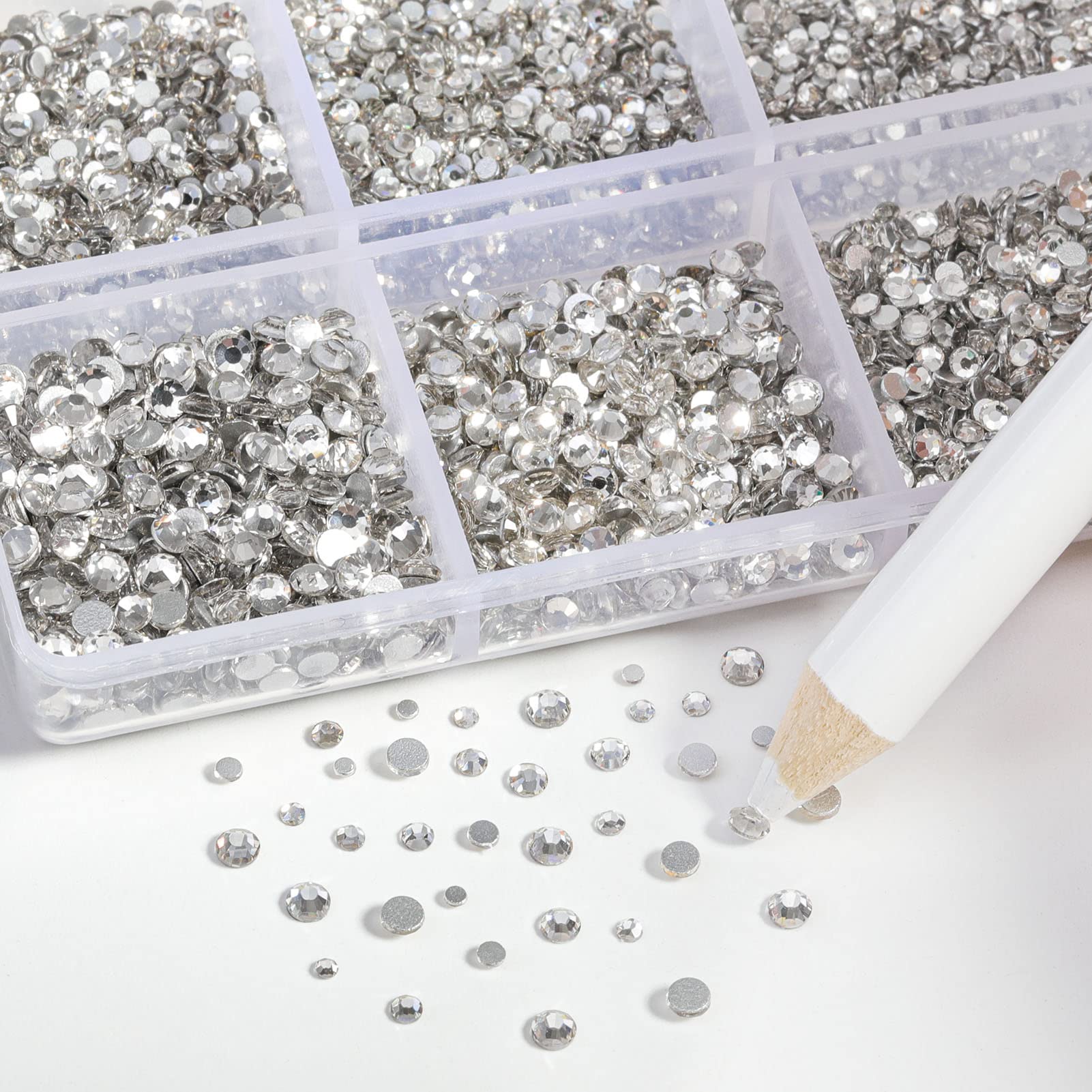 BEADSLAND wax pencil picking up rhinestone demonstrating precise placement benefit