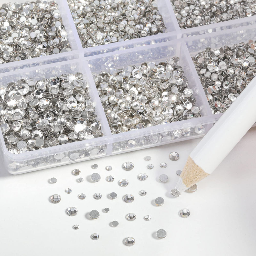 BEADSLAND wax pencil picking up rhinestone demonstrating precise placement benefit