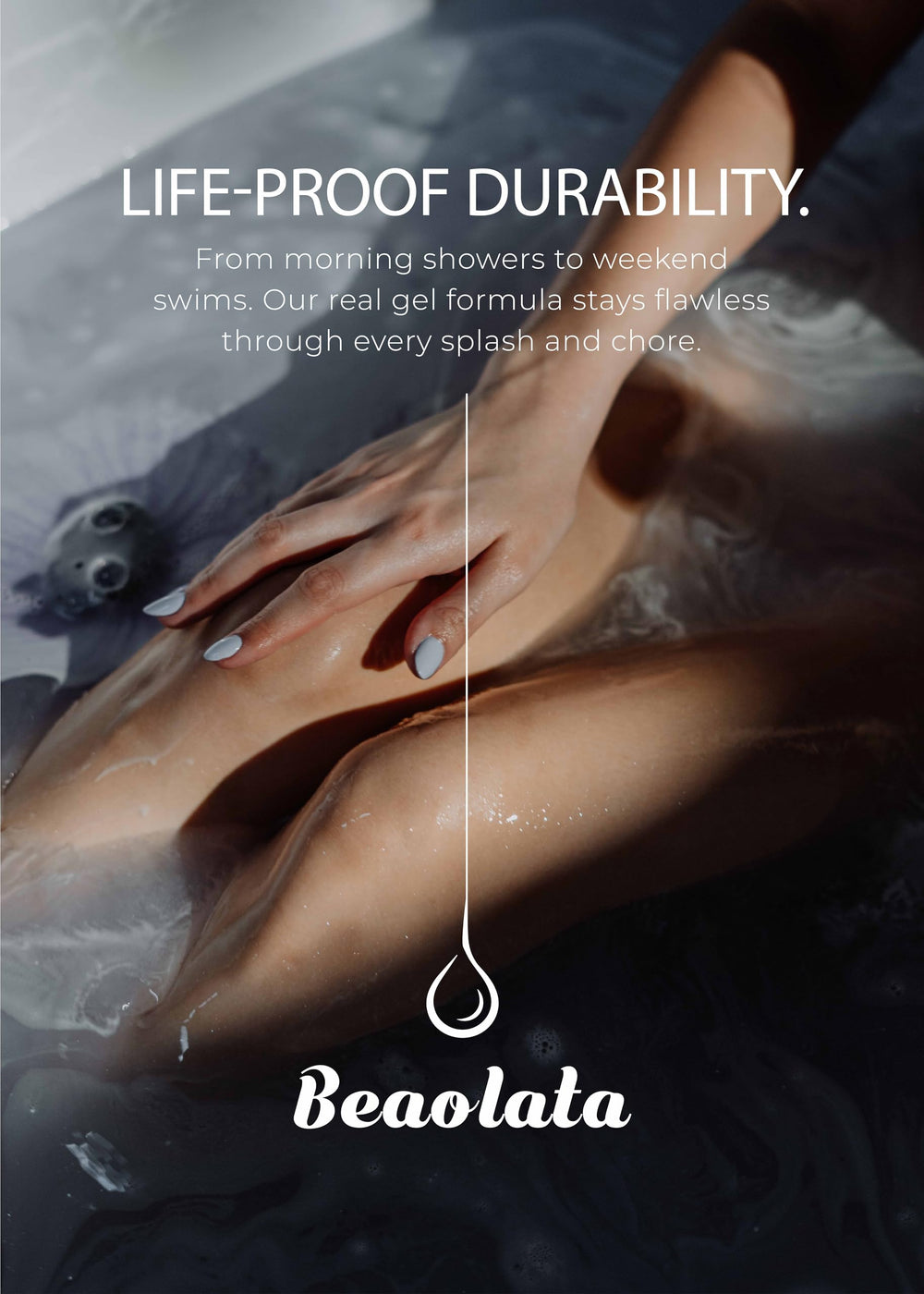 Beaolata lifestyle image of woman typing with glossy nails, proving chip resistance
