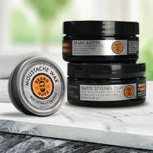 Beard Guyz 3 oz jar beside common items illustrating compact travel size