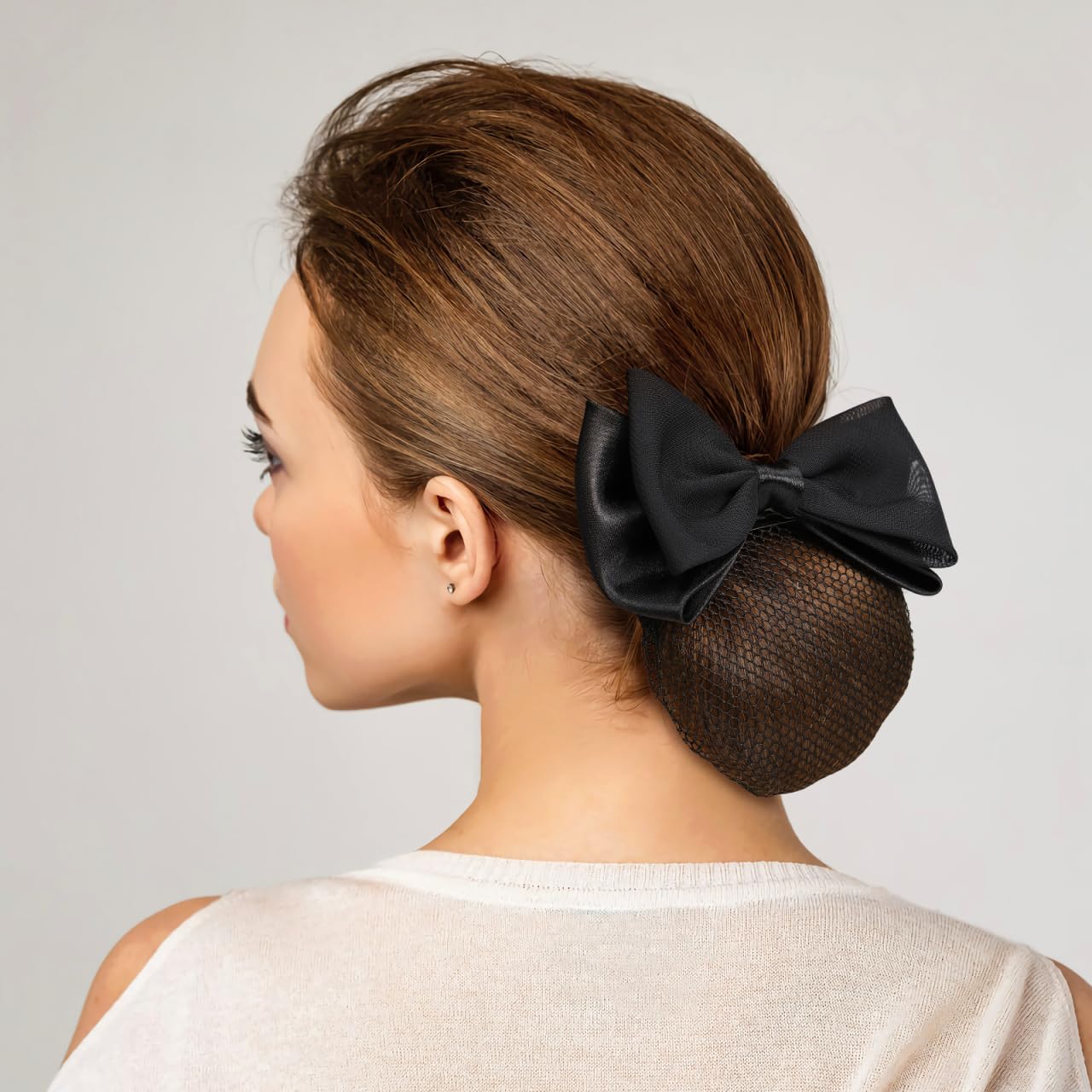 Beaupretty worn by model in office for a neat polished hairstyle