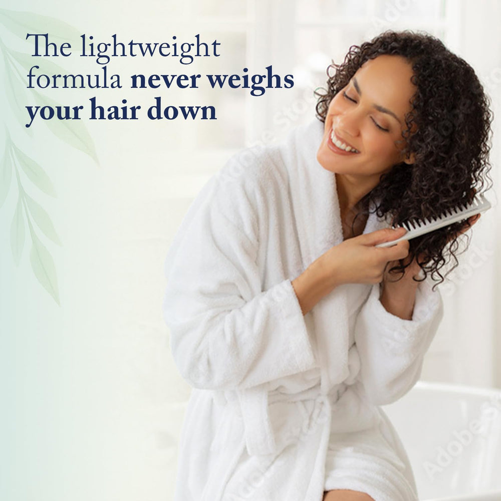 Beauty Without Cruelty applied to damp hair illustrating detangling and frizz control