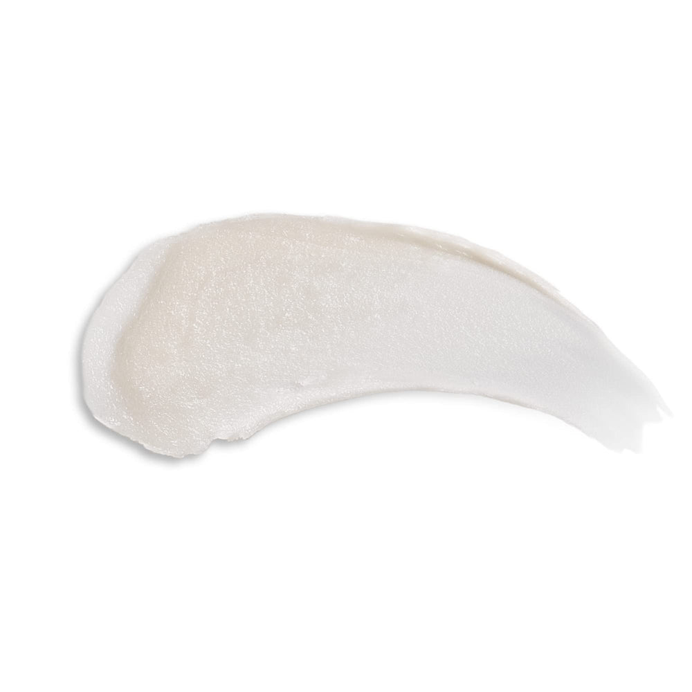 Beekman 1802 open tube texture displaying creamy balm for instant moisture