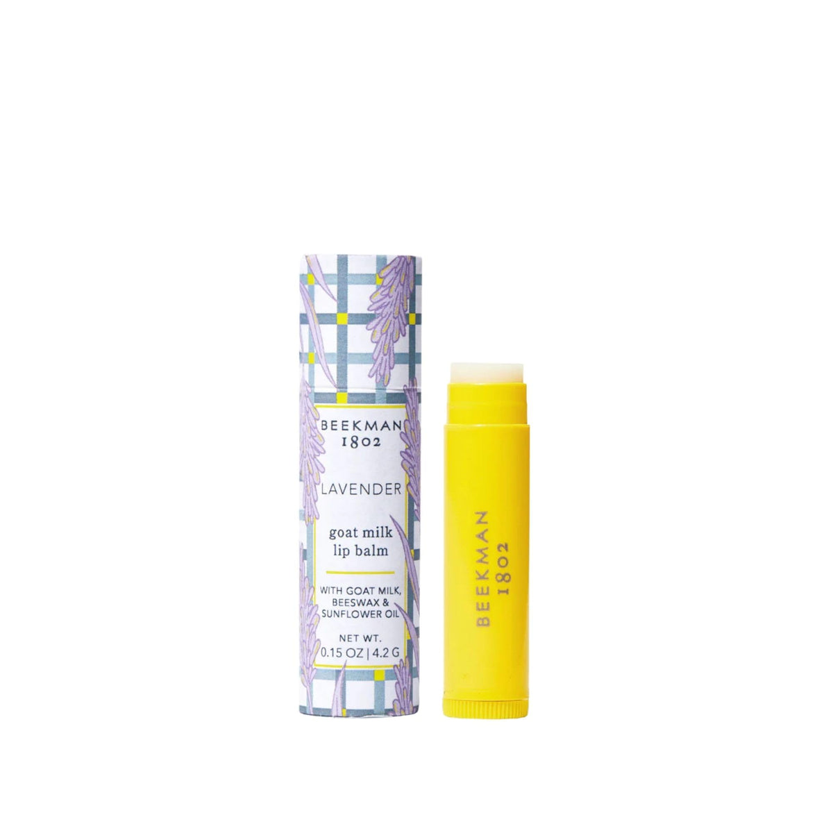 Beekman 1802 front view of lavender goat milk lip balm, shows packaging and benefits